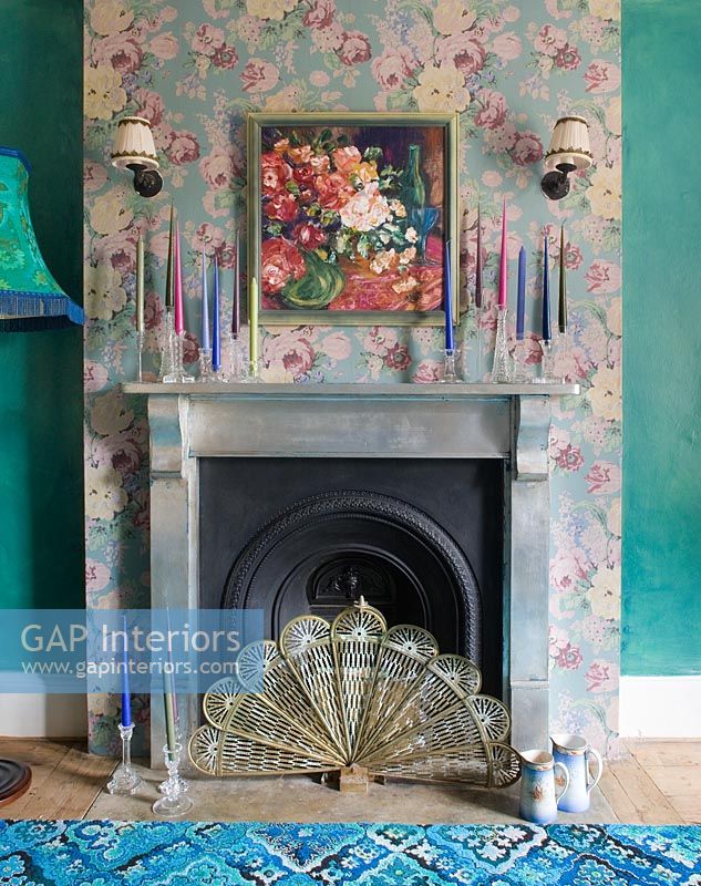 Silver leaf fireplace and Anna French wallpaper