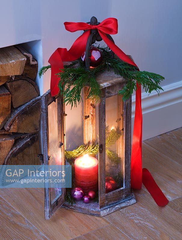 Wooden lantern decorated with Fir foliage