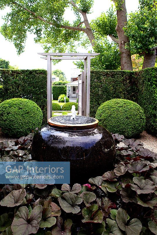 Formal garden with water feature