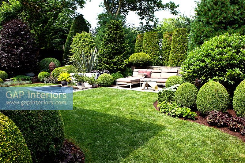 Formal country garden with topiary