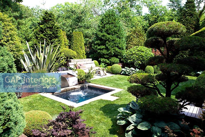 Formal country garden with small pond
