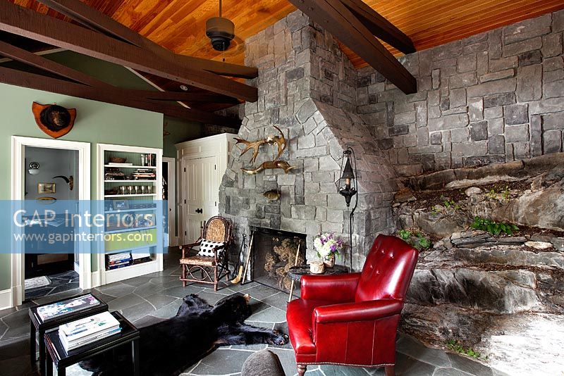Country style living room with stone feature wall