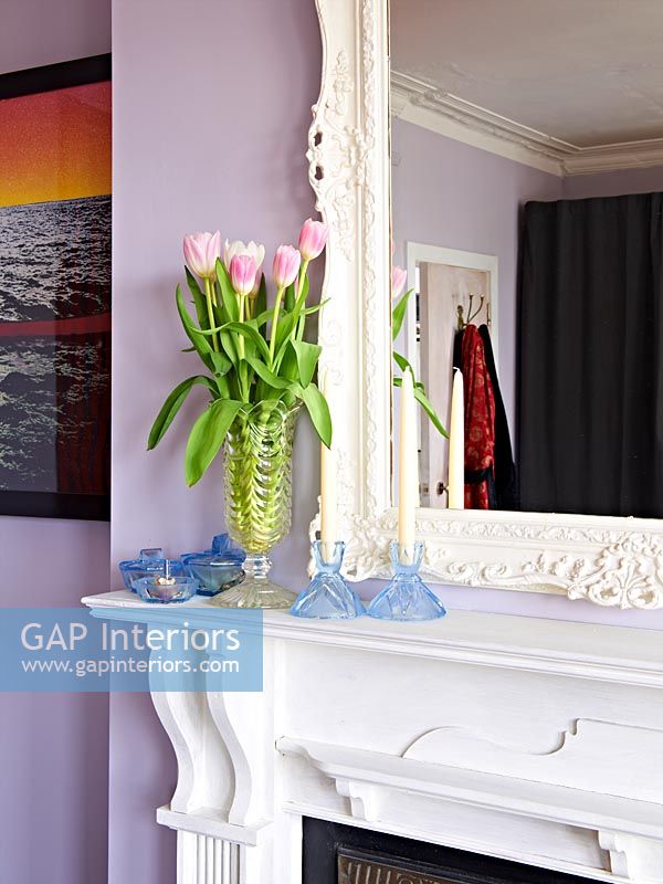 Glass accessories on mantlepiece