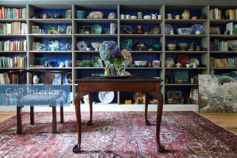 Country dining room with ceramics display