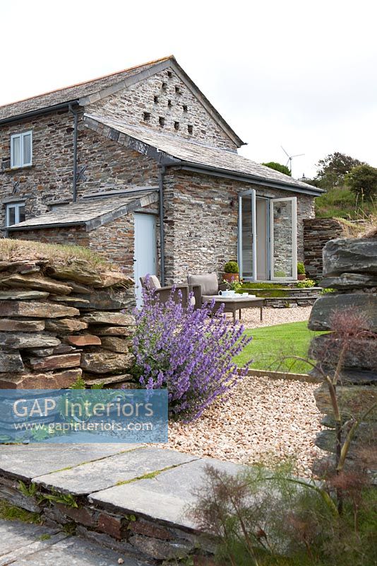 Stone house and garden with drystone walls