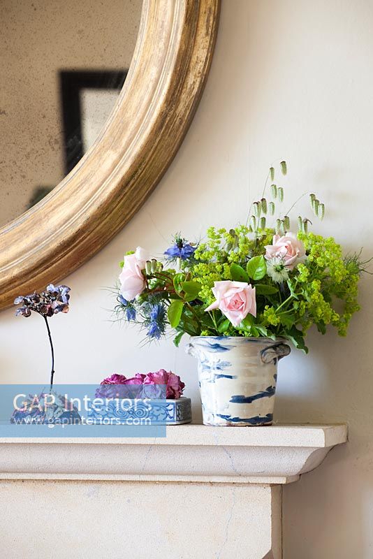 Roses, Love in a mist, Ladys Mantle and grass in patterned vase
