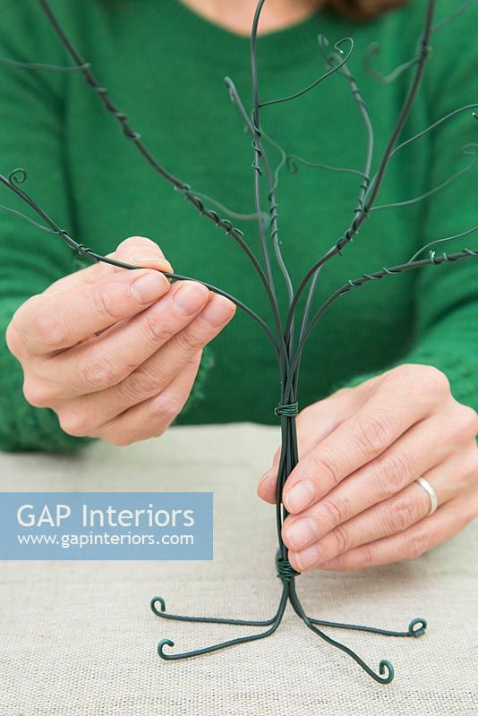 Using cotton wool and garden wire to create a Christmas tree - Bending branches to shape