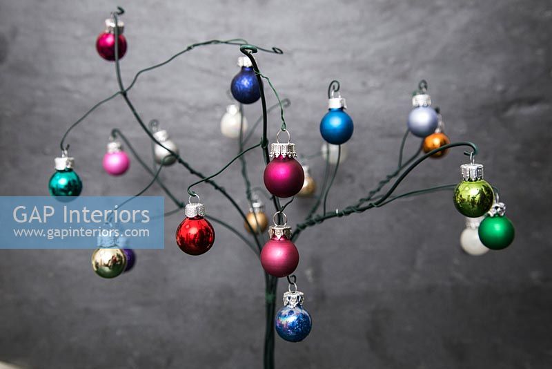 Using cotton wool and garden wire to create a Christmas tree - finished wire tree with glass baubles