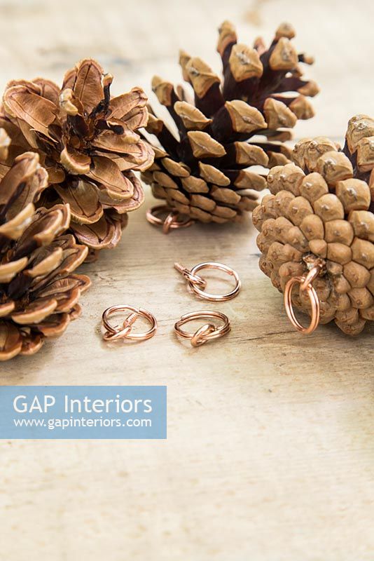 Making christmas decorations with pine cones