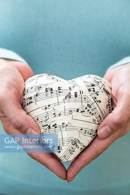 Heart decoration made from old sheet music