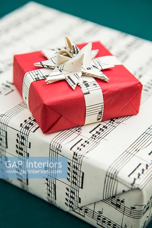 Christmas presents wrapped in sheet music