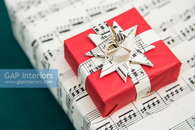 Christmas presents wrapped in sheet music