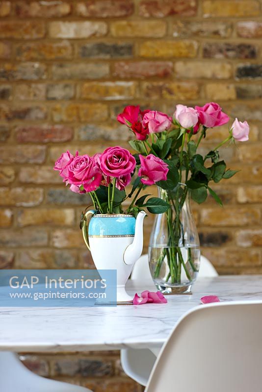 Pink Roses on modern dining table
