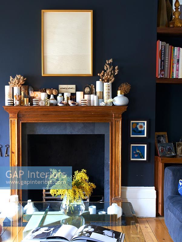 Vases and accessories on mantlepiece