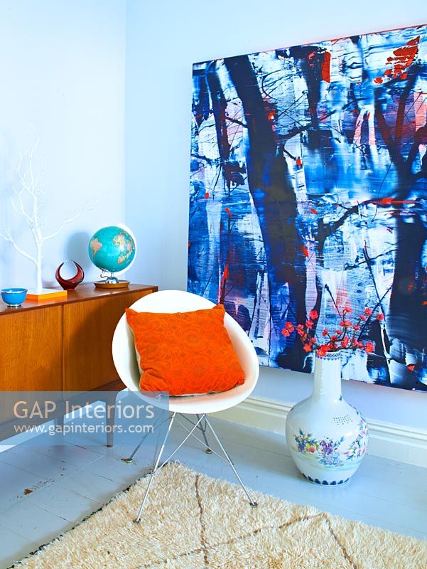 Retro furniture and abstract painting by Ylva