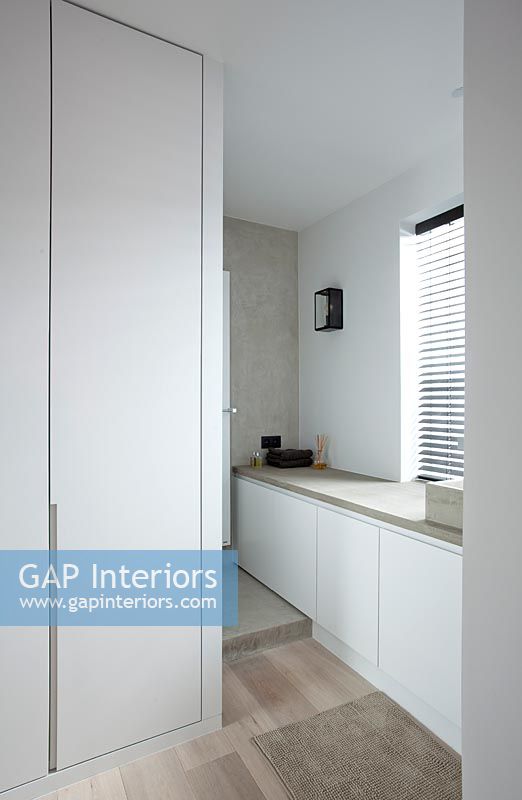 Fitted cupboards in bathroom