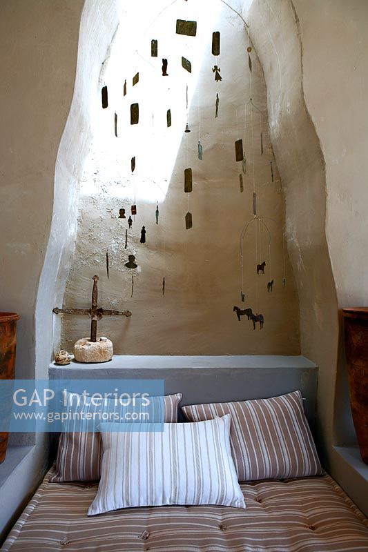 Mobiles hanging in alcove