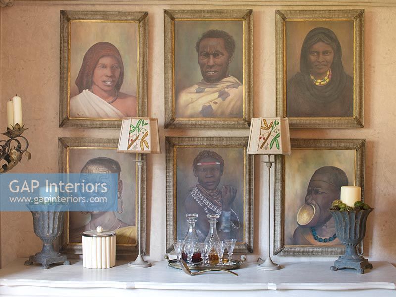Vintage sideboard and african paintings