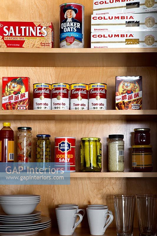 Groceries in kitchen cupboard