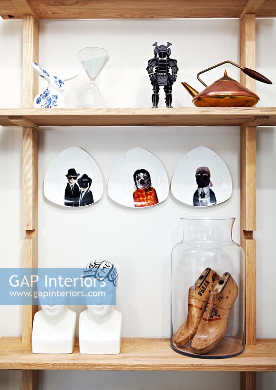 Accessories on wooden shelving