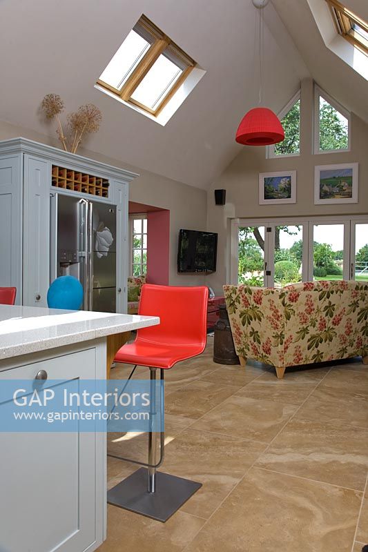 Colourful kitchen extension with seating area