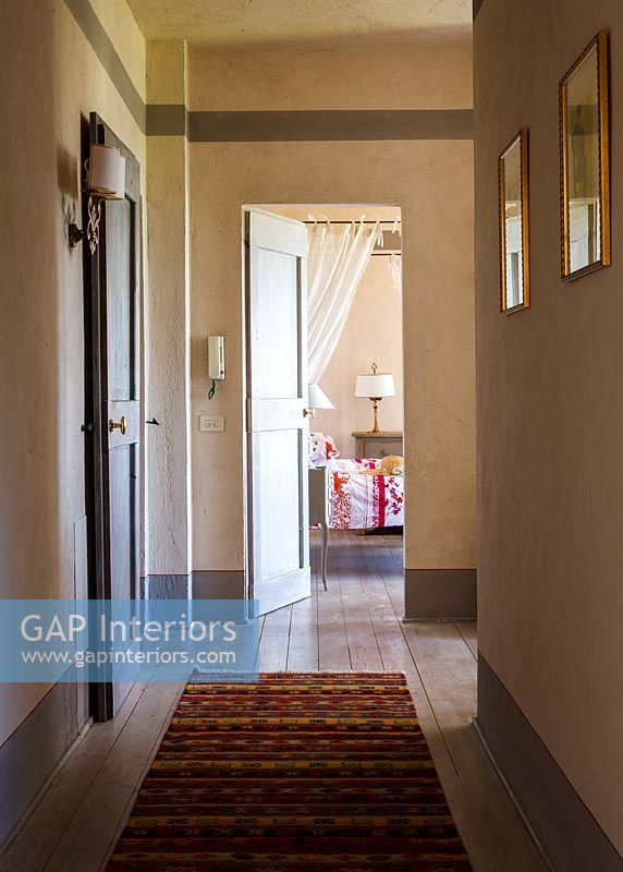 Corridor with patterned rug