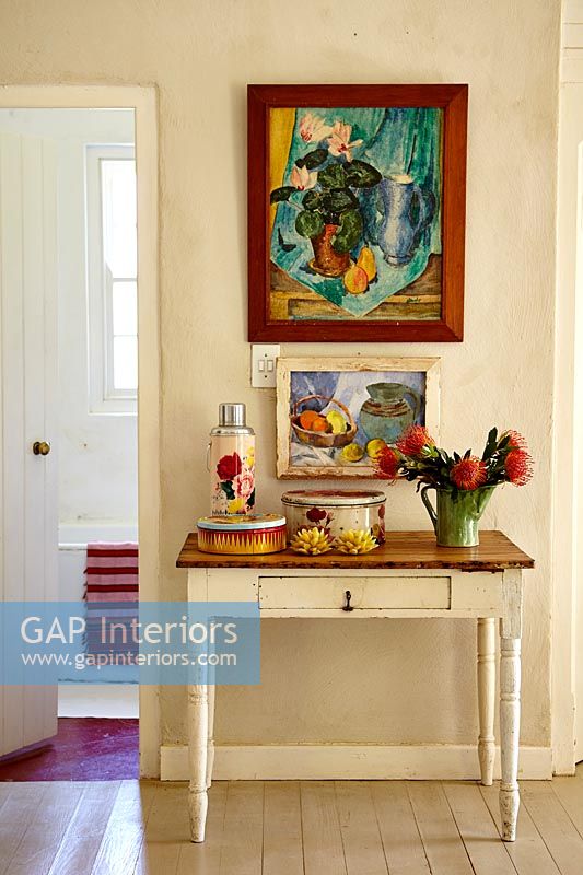Colourful art and accessories in hallway