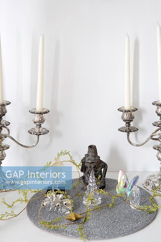 Silver candelabras and glass ornaments