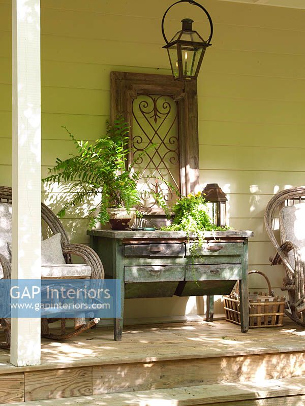 Vintage garden furniture on veranda