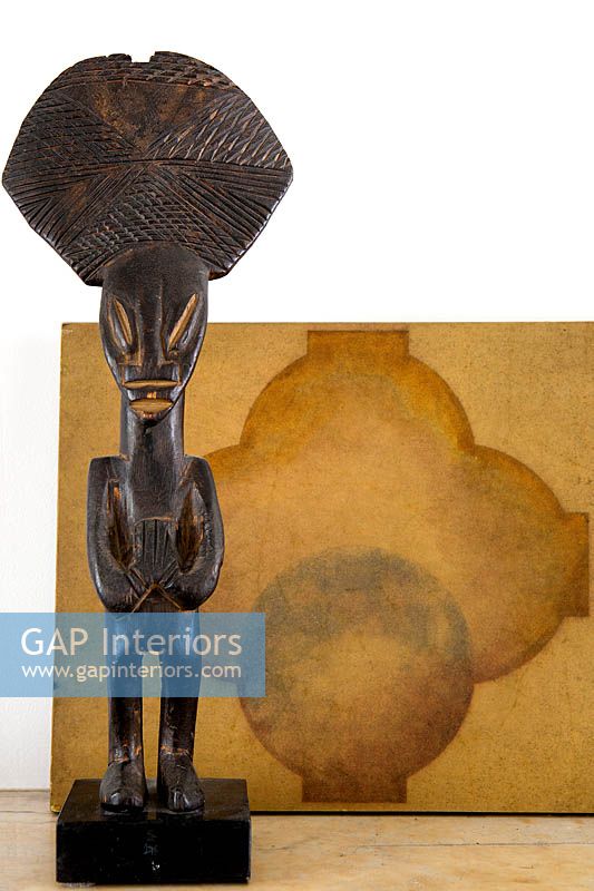 Tribal statue and abstract painting