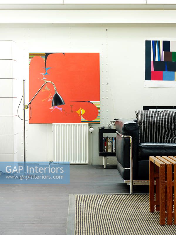 Colourful abstract paintings in living room
