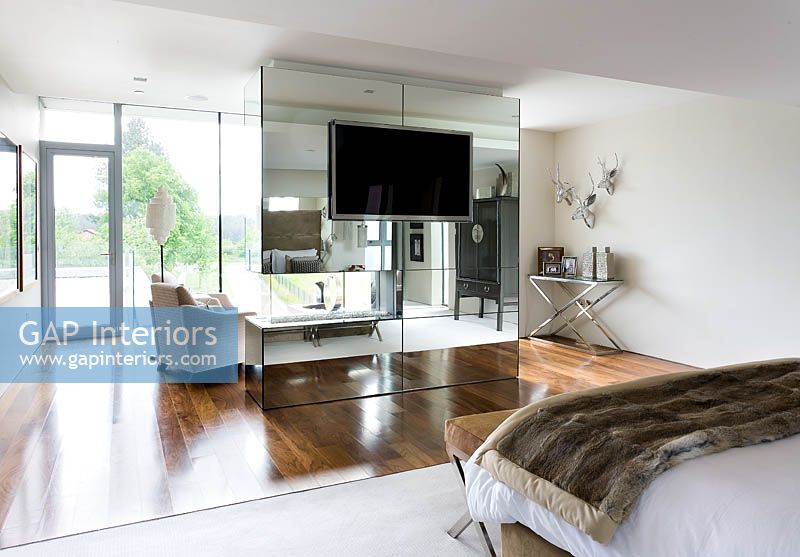 Contemporary bedroom suite with seating area