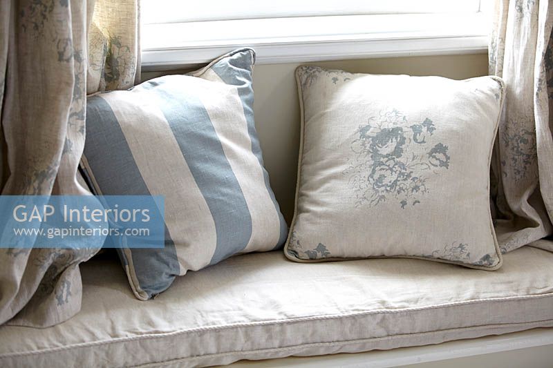 Patterned cushions on window seat