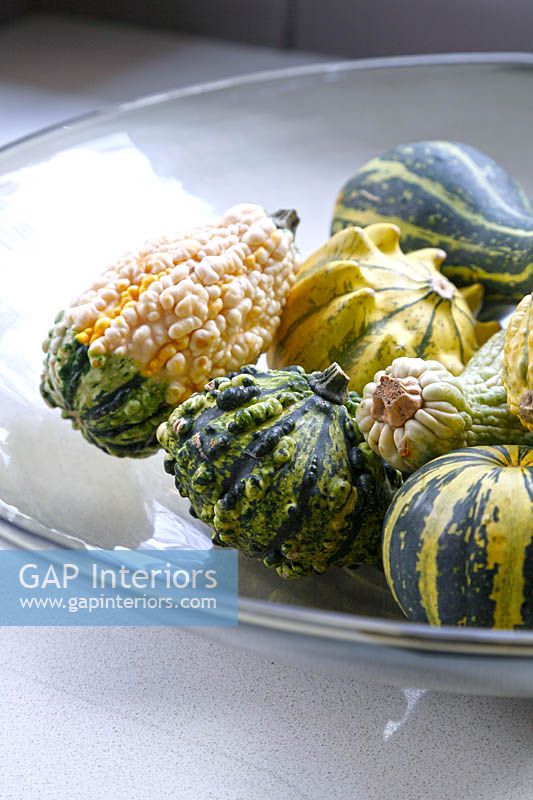 Squashes in glass bowl