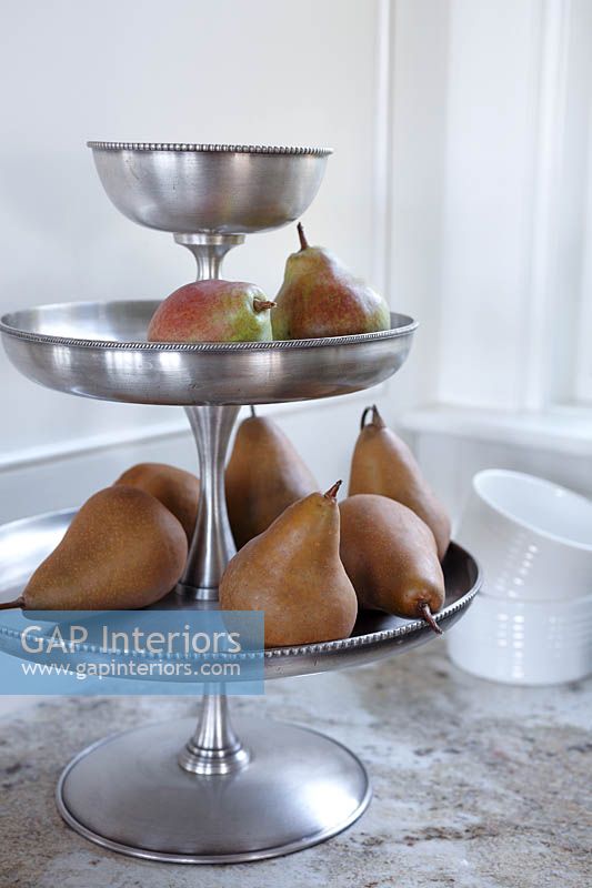Pears on metal cake stand