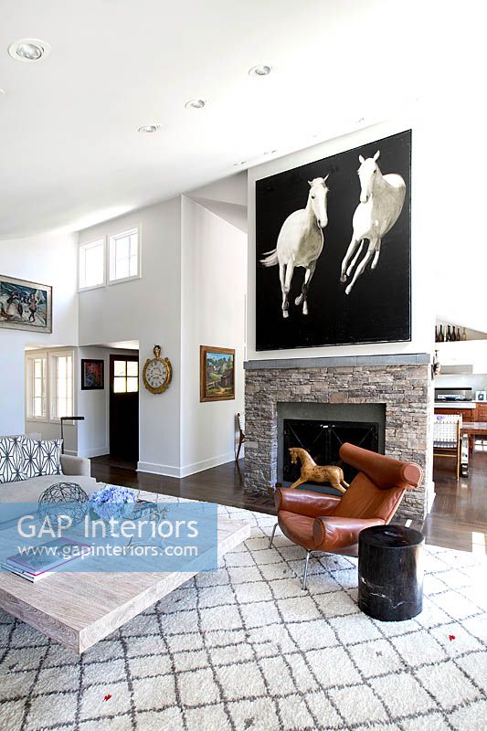 Horse painting above fireplace