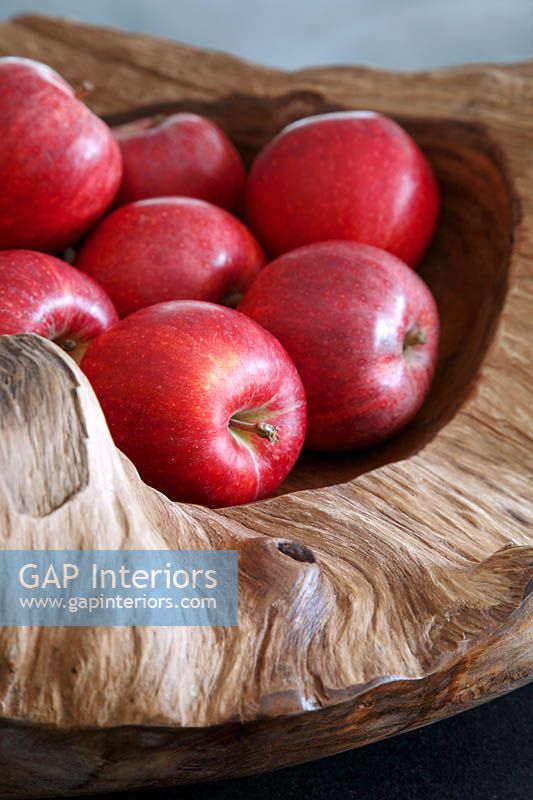 Apples in rustic wooden bowl