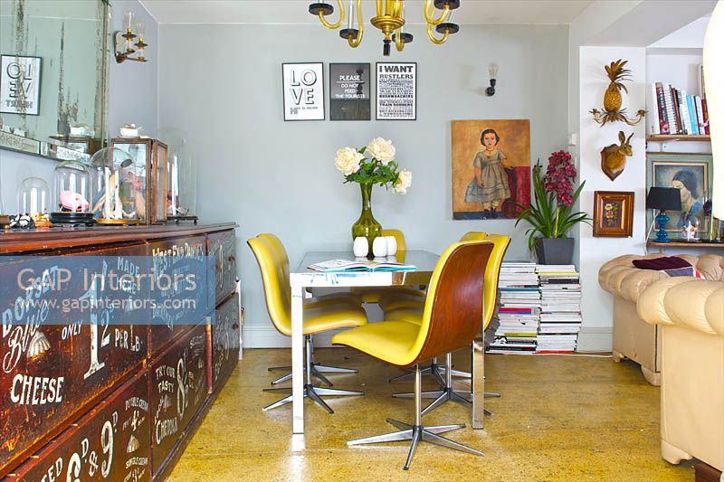 Eclectic open plan living and dining rooms