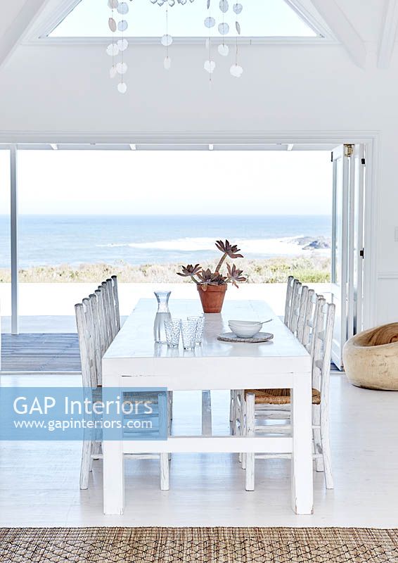 Open plan dining area with sea view