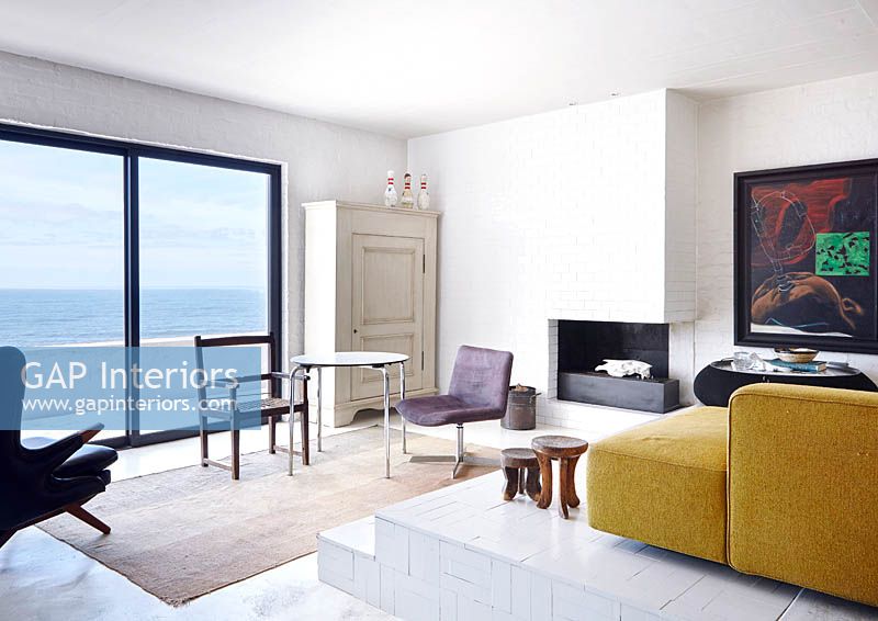 Contemporary living room overlooking sea