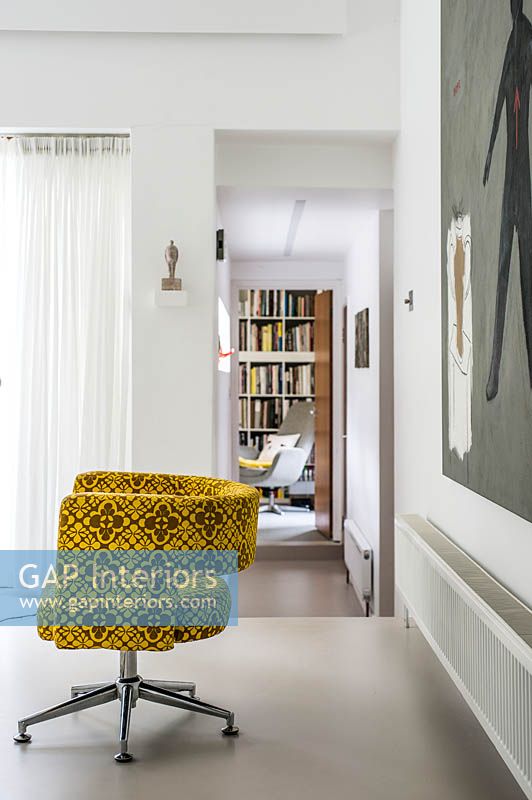Yellow armchair on resin floor