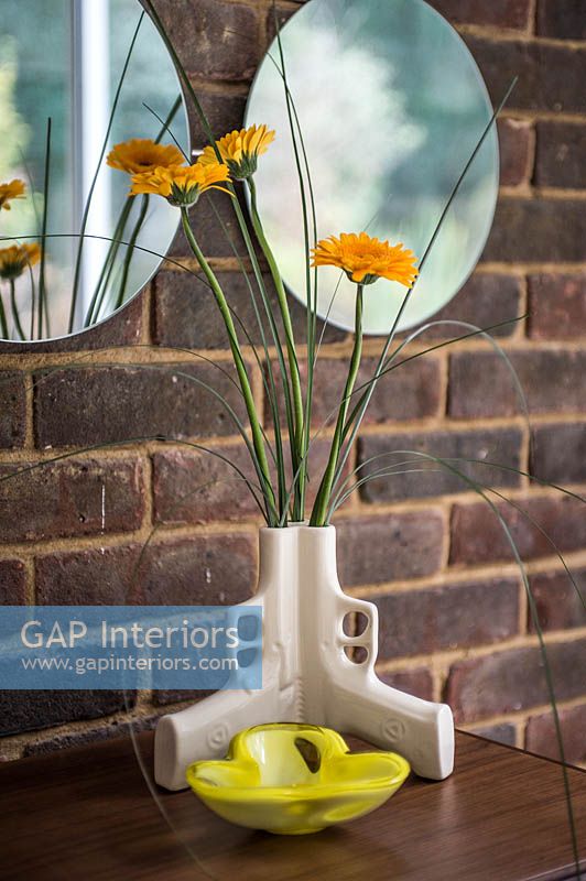 Gerbera flowers in sculptural vase