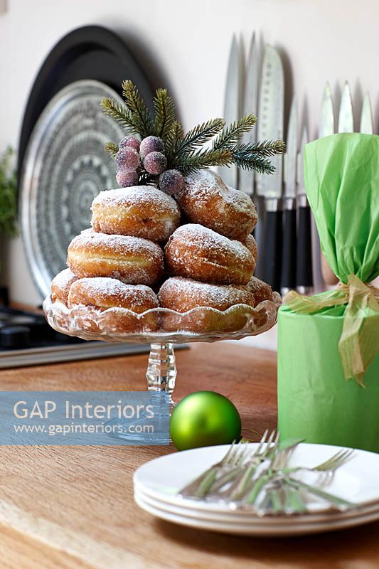 Doughnuts on glass cake stand