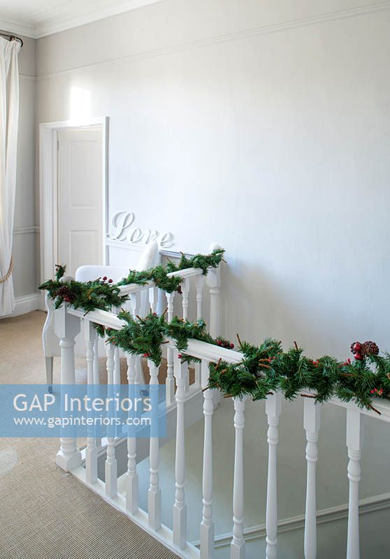 Garland wrapped around bannisters