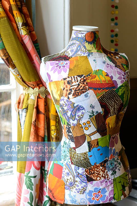 Tailors dummy covered in vintage fabrics