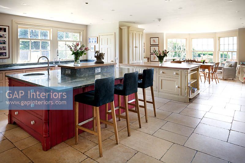 Country style kitchen diner with limestone flooring