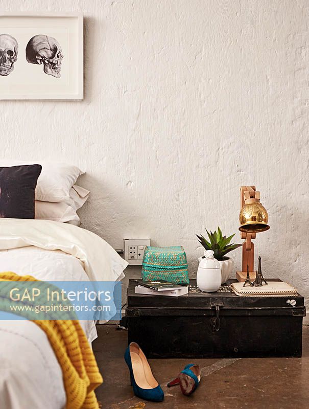 Metal trunk used as bedside table