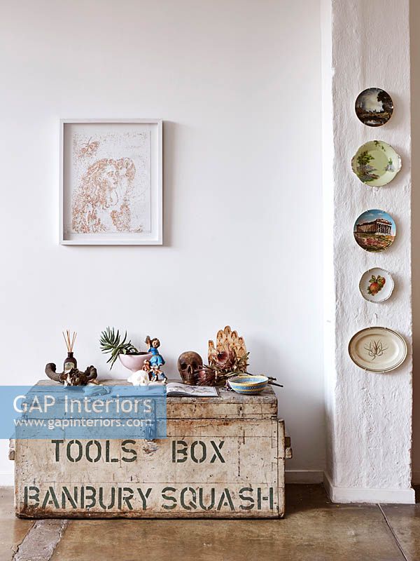 Eclectic accessories on wooden trunk