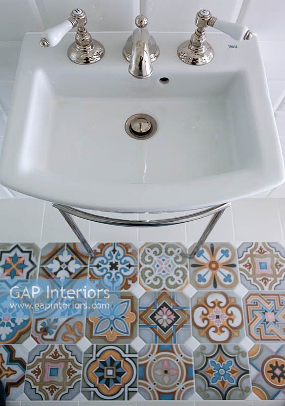 Patterned tiles on bathroom floor