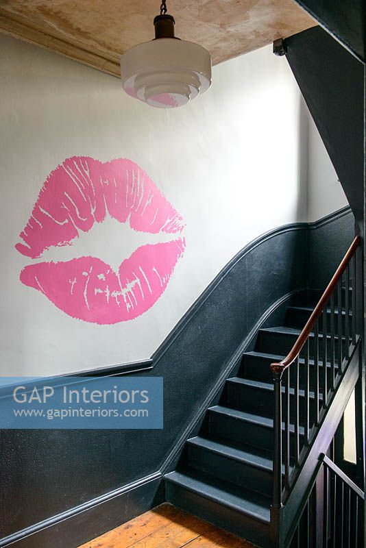 Lipstick print on stair wall